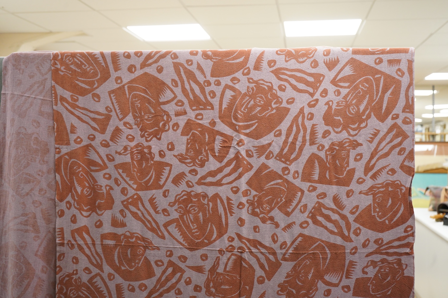 A 1983 A brown mauve paper cut hand printed length of raw silk, designed by Paul Waring, (ex RCA 1983 Syds). 92cm wide x 480cm long. Condition- good, may need dry cleaning.